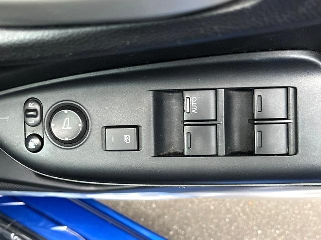 フィット 13G・Lパッケージ 禁煙車 スマートキー ビルトインETC オートライト オートエアコン Bluetooth CD DVD再生 地デジ バックカメラ 横滑り防止装置 電動格納ミラー ドアバイザー パワーウインドウ(26枚目)