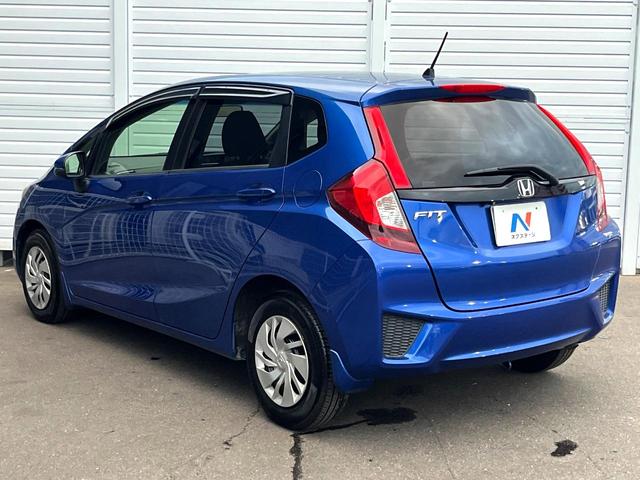フィット 13G・Lパッケージ 禁煙車 スマートキー ビルトインETC オートライト オートエアコン Bluetooth CD DVD再生 地デジ バックカメラ 横滑り防止装置 電動格納ミラー ドアバイザー パワーウインドウ(39枚目)