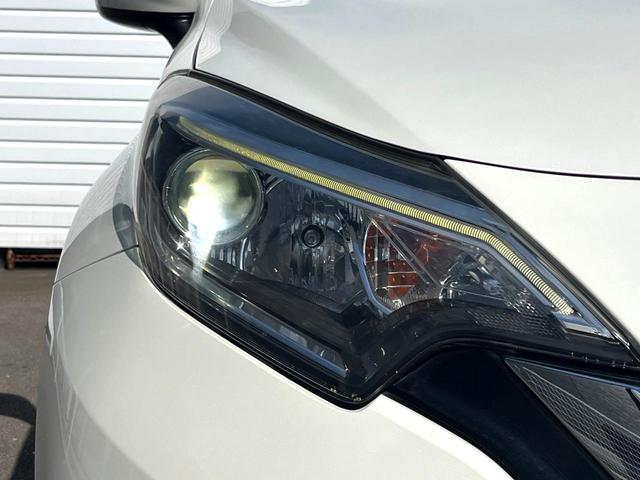 ノート ｅ－パワー　メダリスト　純正ＳＤナビ　衝突被害軽減システム　禁煙車　ハーフレザーシート　スマートキー　オートライト　オートエアコン　純正１５インチアルミ　Ｂｌｕｅｔｏｏｔｈ　ＣＤ　ＤＶＤ再生　フルセグ（12枚目）