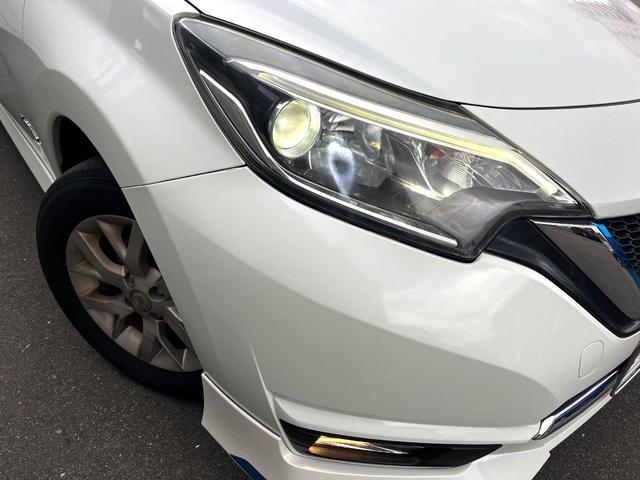 ノート ｅ－パワー　メダリスト　純正ＳＤナビ　衝突被害軽減システム　禁煙車　ハーフレザーシート　スマートキー　オートライト　オートエアコン　純正１５インチアルミ　Ｂｌｕｅｔｏｏｔｈ　ＣＤ　ＤＶＤ再生　フルセグ（48枚目）