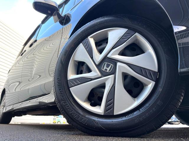 フリードハイブリッド ジャストセレクション　両側電動ドア　純正ＳＤナビ　バックカメラ　禁煙車　スマートキー　ＨＩＤヘッド　ＥＴＣ　クルコン　オートライト　オートエアコン　ＣＤ　ＤＶＤ再生　地デジ（13枚目）