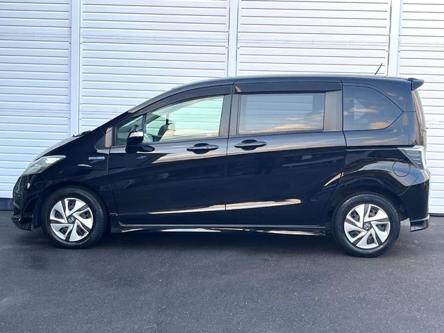 フリードハイブリッド ジャストセレクション　両側電動ドア　純正ＳＤナビ　バックカメラ　禁煙車　スマートキー　ＨＩＤヘッド　ＥＴＣ　クルコン　オートライト　オートエアコン　ＣＤ　ＤＶＤ再生　地デジ（43枚目）