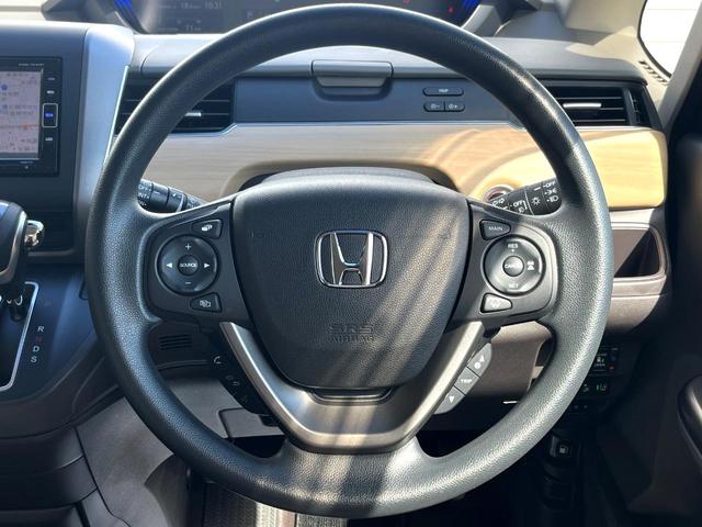 フリード Ｇ・ホンダセンシング　両側電動ドア　純正ＳＤナビ　バックカメラ　衝突被害軽減システム　レーダークルーズ　スマートキー　ＨＩＤヘッド　ナビ連動ＥＴＣ　車線逸脱警報　オートエアコン　Ｂｌｕｅｔｏｏｔｈ　ＣＤ　地デジ（12枚目）