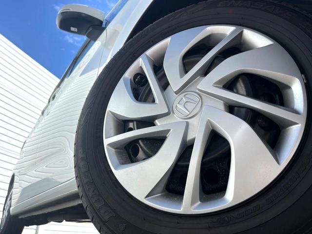 フリード Ｇ・ホンダセンシング　両側電動ドア　純正ＳＤナビ　バックカメラ　衝突被害軽減システム　レーダークルーズ　スマートキー　ＨＩＤヘッド　ナビ連動ＥＴＣ　車線逸脱警報　オートエアコン　Ｂｌｕｅｔｏｏｔｈ　ＣＤ　地デジ（14枚目）