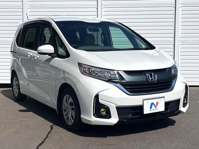 フリード Ｇ・ホンダセンシング　両側電動ドア　純正ＳＤナビ　バックカメラ　衝突被害軽減システム　レーダークルーズ　スマートキー　ＨＩＤヘッド　ナビ連動ＥＴＣ　車線逸脱警報　オートエアコン　Ｂｌｕｅｔｏｏｔｈ　ＣＤ　地デジ（17枚目）