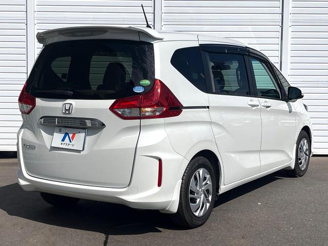 フリード Ｇ・ホンダセンシング　両側電動ドア　純正ＳＤナビ　バックカメラ　衝突被害軽減システム　レーダークルーズ　スマートキー　ＨＩＤヘッド　ナビ連動ＥＴＣ　車線逸脱警報　オートエアコン　Ｂｌｕｅｔｏｏｔｈ　ＣＤ　地デジ（18枚目）