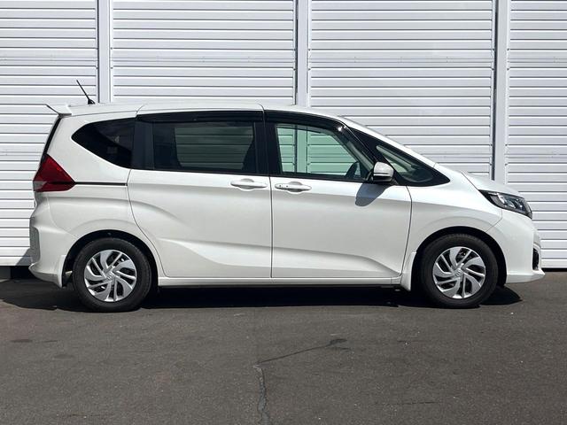 フリード Ｇ・ホンダセンシング　両側電動ドア　純正ＳＤナビ　バックカメラ　衝突被害軽減システム　レーダークルーズ　スマートキー　ＨＩＤヘッド　ナビ連動ＥＴＣ　車線逸脱警報　オートエアコン　Ｂｌｕｅｔｏｏｔｈ　ＣＤ　地デジ（52枚目）