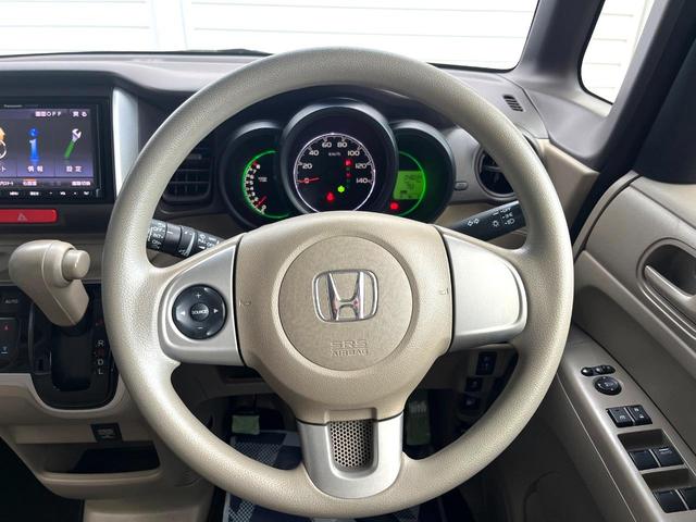 Ｎ－ＢＯＸ Ｇ・Ｌパッケージ　電動スライドドア　ＳＤナビ　バックカメラ　禁煙車　スマートキー　純正１４インチアルミ　オートエアコン　ＣＤ　地デジ　横滑り防止装置　電動格納ミラー　ドアバイザー　パワーステアリング　パワーウィンドウ（10枚目）