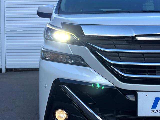 ヴェルファイアハイブリッド Ｘ　４ＷＤ　両側電動ドア　純正ＨＤＤナビ　バックカメラ　コーナーセンサー　ＨＩＤヘッド　ビルトインＥＴＣ　クルコン　オートライト　デュアルエアコン　リアエアコン　Ｂｌｕｅｔｏｏｔｈ　地デジ（12枚目）
