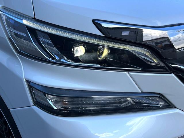 ヴェルファイアハイブリッド Ｘ　４ＷＤ　両側電動ドア　純正ＨＤＤナビ　バックカメラ　コーナーセンサー　ＨＩＤヘッド　ビルトインＥＴＣ　クルコン　オートライト　デュアルエアコン　リアエアコン　Ｂｌｕｅｔｏｏｔｈ　地デジ（42枚目）