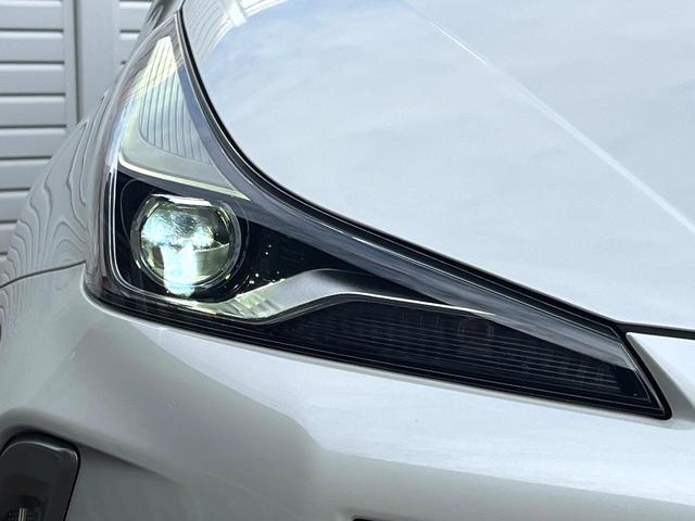 プリウス Ａプレミアム　ツーリングセレクション　純正ナビ　全周囲カメラ　１００Ｖ電源　衝突被害軽減システム　禁煙車　レザー調シート　前席シートエアコン　パワーシート　ドラレコ　ＬＥＤヘッド　ビルトインＥＴＣ　クルコン　オートライト（56枚目）