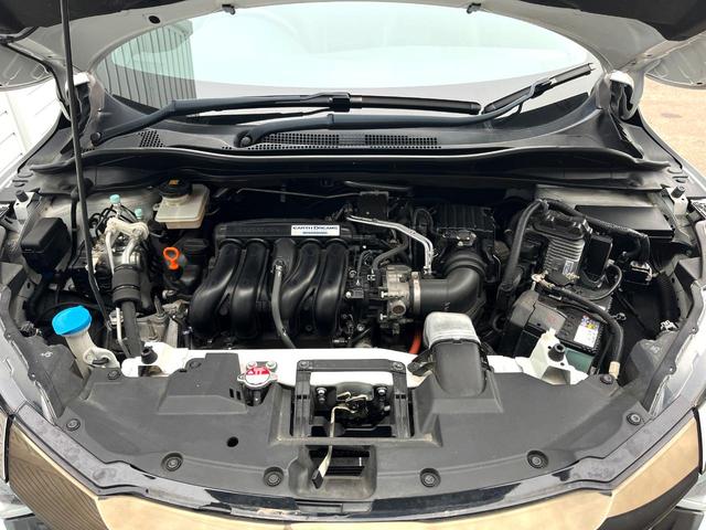 ヴェゼル ハイブリッドRS・ホンダセンシング 純正SDナビ 全周囲カメラ 衝突被害軽減システム レーダークルーズ 禁煙車 ハーフレザーシート ドラレコ スマートキー LEDヘッド ビルトインETC 純正15インチアルミ 車線逸脱警報(18枚目)