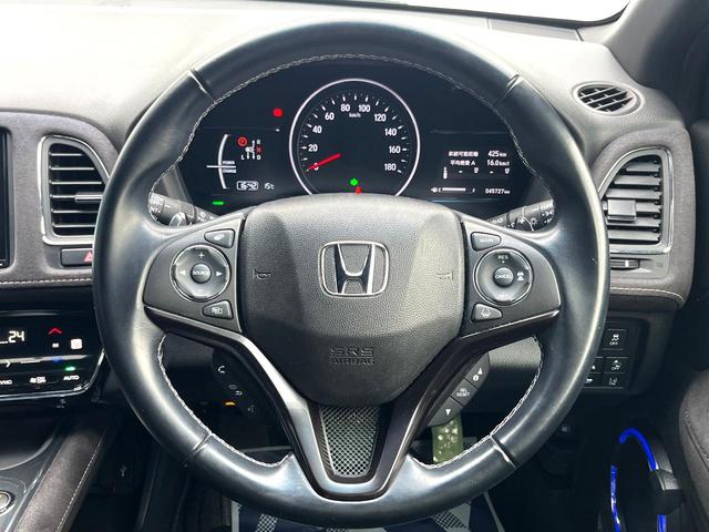 ヴェゼル ハイブリッドRS・ホンダセンシング 純正SDナビ 全周囲カメラ 衝突被害軽減システム レーダークルーズ 禁煙車 ハーフレザーシート ドラレコ スマートキー LEDヘッド ビルトインETC 純正15インチアルミ 車線逸脱警報(21枚目)