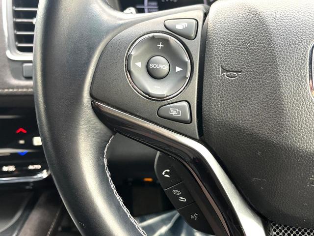 ヴェゼル ハイブリッドRS・ホンダセンシング 純正SDナビ 全周囲カメラ 衝突被害軽減システム レーダークルーズ 禁煙車 ハーフレザーシート ドラレコ スマートキー LEDヘッド ビルトインETC 純正15インチアルミ 車線逸脱警報(29枚目)