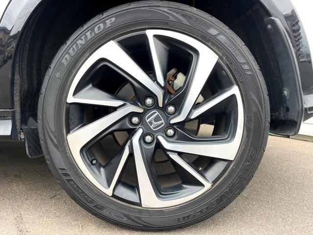 ヴェゼル ハイブリッドRS・ホンダセンシング 純正SDナビ 全周囲カメラ 衝突被害軽減システム レーダークルーズ 禁煙車 ハーフレザーシート ドラレコ スマートキー LEDヘッド ビルトインETC 純正15インチアルミ 車線逸脱警報(50枚目)