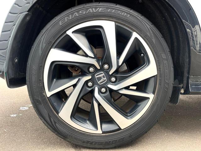 ヴェゼル ハイブリッドRS・ホンダセンシング 純正SDナビ 全周囲カメラ 衝突被害軽減システム レーダークルーズ 禁煙車 ハーフレザーシート ドラレコ スマートキー LEDヘッド ビルトインETC 純正15インチアルミ 車線逸脱警報(52枚目)