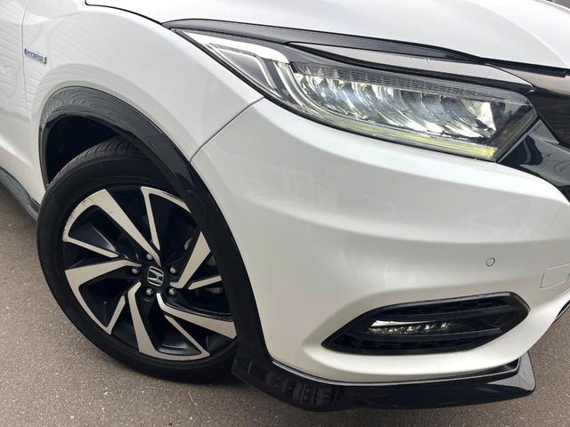 ヴェゼル ハイブリッドRS・ホンダセンシング 純正SDナビ 全周囲カメラ 衝突被害軽減システム レーダークルーズ 禁煙車 ハーフレザーシート ドラレコ スマートキー LEDヘッド ビルトインETC 純正15インチアルミ 車線逸脱警報(56枚目)