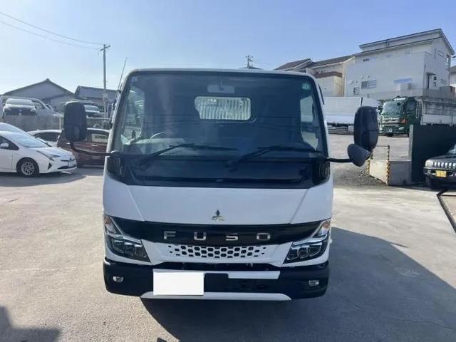 キャンター ダンプ　極東製強化ダンプ　三方開　５速ミッション　スマートキー　助手席側電動格納ミラー　アドブルー　燃料タンク７０Ｌ　エンジン型式４Ｐ１０　ボディ内寸長３０５０ｍｍ幅１６００ｍｍ高３８０ｍｍ（16枚目）