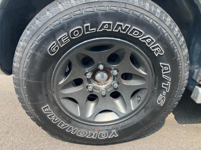 パジェロ ロング　スーパーエクシード　４ＷＤ　貨物登録車　４名乗車　ガソリン車　クルーズコントロール　社外アルミホイール　ジオランダータイヤ　　ナビ　サンルーフ　本革シート　パワーシート　シートヒーター　ＥＴＣ　ウッドコンビハンドル（7枚目）