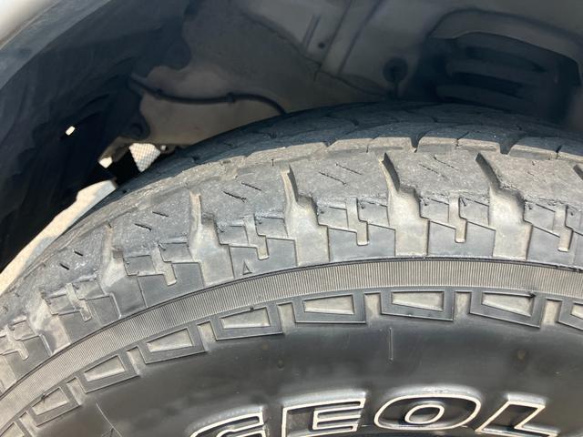 パジェロ ロング　スーパーエクシード　４ＷＤ　貨物登録車　４名乗車　ガソリン車　クルーズコントロール　社外アルミホイール　ジオランダータイヤ　　ナビ　サンルーフ　本革シート　パワーシート　シートヒーター　ＥＴＣ　ウッドコンビハンドル（8枚目）
