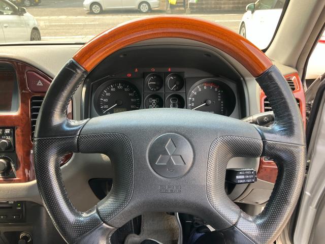 パジェロ ロング　スーパーエクシード　４ＷＤ　貨物登録車　４名乗車　ガソリン車　クルーズコントロール　社外アルミホイール　ジオランダータイヤ　　ナビ　サンルーフ　本革シート　パワーシート　シートヒーター　ＥＴＣ　ウッドコンビハンドル（26枚目）