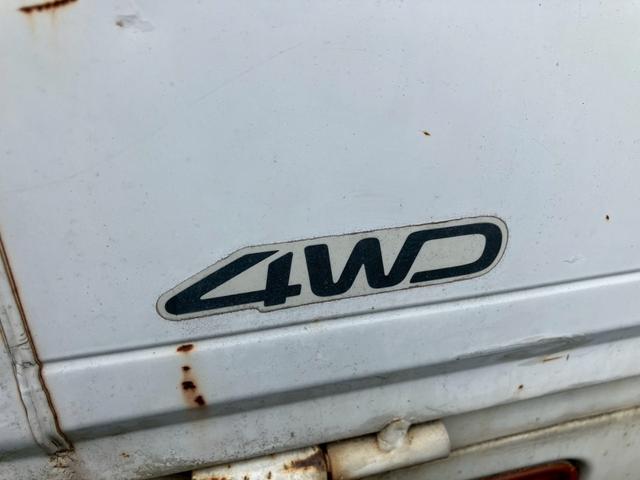 ハイゼットトラック エアコン・パワステ　スペシャル　５速ＭＴ　４ＷＤ　３方開　ナビ付（7枚目）