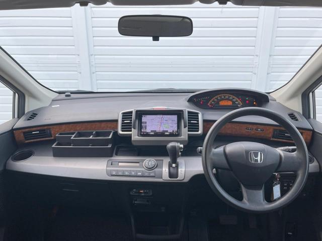 フリード G ハイウェイエディション 両側電動ドア SDナビ バックカメラ HIDヘッド ビルトインETC 純正15インチアルミ オートライト オートエアコン Bluetooth CD DVD再生 地デジ キーレス(2枚目)