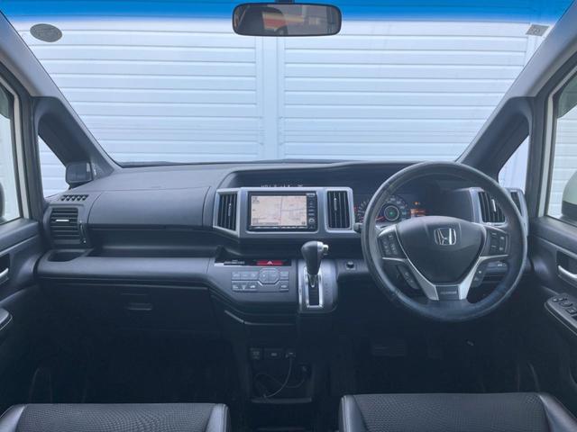 ステップワゴンスパーダ Ｚ　クールスピリット　インターナビ　セレクション　両側電動ドア　純正ＳＤナビ　後席モニター　バックカメラ　ハーフレザーシート　スマートキー　ＨＩＤヘッド　ビルトインＥＴＣ　クルコン　オートライト　オートエアコン　Ｂｌｕｅｔｏｏｔｈ　ＣＤ　ＤＶＤ再生（2枚目）