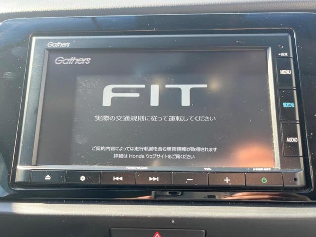 フィット ｅ：ＨＥＶホーム　純正ＳＤナビ　バックカメラ　衝突被害軽減システム　レーダークルーズ　ドラレコ　コーナーセンサー　スマートキー　ＬＥＤヘッド　ＥＴＣ　車線逸脱警報　オートライト　オートエアコン　Ｂｌｕｅｔｏｏｔｈ（4枚目）