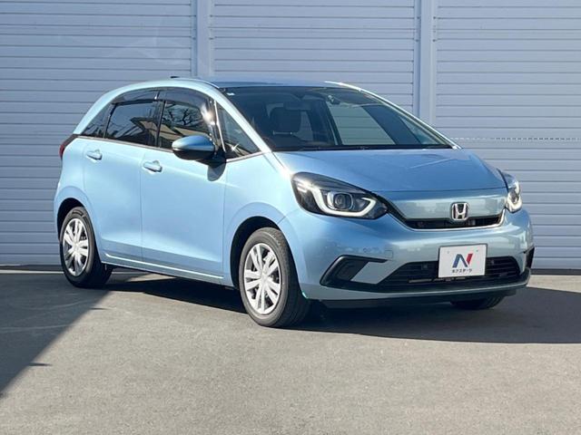 フィット ｅ：ＨＥＶホーム　純正ＳＤナビ　バックカメラ　衝突被害軽減システム　レーダークルーズ　ドラレコ　コーナーセンサー　スマートキー　ＬＥＤヘッド　ＥＴＣ　車線逸脱警報　オートライト　オートエアコン　Ｂｌｕｅｔｏｏｔｈ（19枚目）