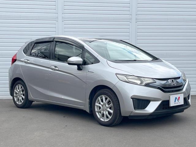 フィットハイブリッド Ｆパッケージ　バックカメラ　スマートキー　ＥＴＣ　純正１５インチアルミ　オートエアコン　Ｂｌｕｅｔｏｏｔｈ　ＣＤ　ＤＶＤ再生　バニティーミラー　電動格納ミラー（17枚目）