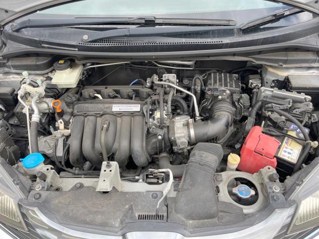 フィットハイブリッド Ｆパッケージ　バックカメラ　スマートキー　ＥＴＣ　純正１５インチアルミ　オートエアコン　Ｂｌｕｅｔｏｏｔｈ　ＣＤ　ＤＶＤ再生　バニティーミラー　電動格納ミラー（19枚目）