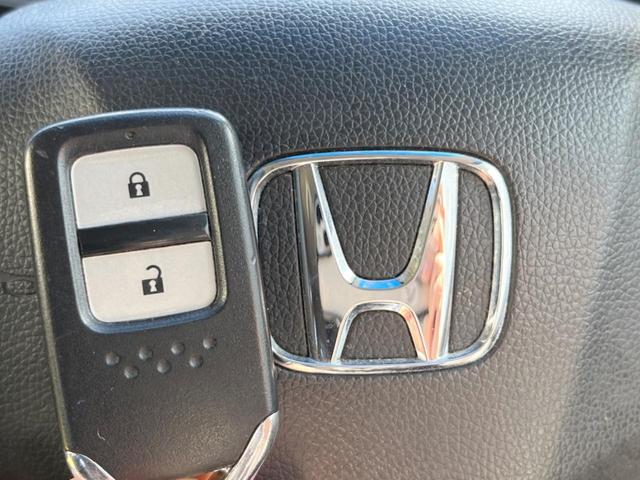 フィットハイブリッド Fパッケージ 純正SDナビ バックカメラ スマートキー ETC オートエアコン Bluetooth CD DVD再生 地デジ 電動格納ミラー(7枚目)