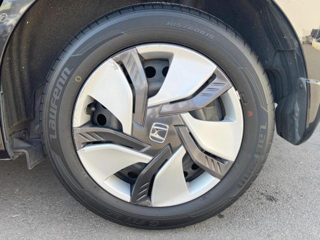 フィットハイブリッド Fパッケージ 純正SDナビ バックカメラ スマートキー ETC オートエアコン Bluetooth CD DVD再生 地デジ 電動格納ミラー(26枚目)