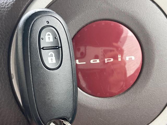 アルトラパンショコラ Ｘ　ハーフレザーシート　スマートキー　ＨＩＤヘッド　純正１４インチアルミ　オートライト　オートエアコン　ＣＤ（5枚目）