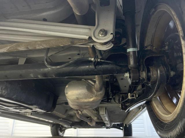 アルトラパンショコラ Ｘ　ハーフレザーシート　スマートキー　ＨＩＤヘッド　純正１４インチアルミ　オートライト　オートエアコン　ＣＤ（37枚目）