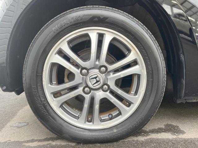 N-BOX G・Lパッケージ 電動スライドドア スマートキー HIDヘッド ETC 純正14インチアルミ オートライト オートエアコン CD(28枚目)