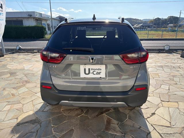 フィット ｅ：ＨＥＶクロスター　バックカメラ　ナビ　ＴＶ　クリアランスソナー　オートクルーズコントロール　レーンアシスト　衝突被害軽減システム　アルミホイール　オートライト　ＬＥＤヘッドランプ　ヘッドライトウォッシャー　スマートキー（17枚目）