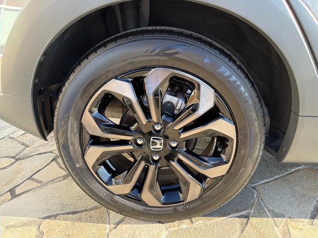 フィット ｅ：ＨＥＶクロスター　バックカメラ　ナビ　ＴＶ　クリアランスソナー　オートクルーズコントロール　レーンアシスト　衝突被害軽減システム　アルミホイール　オートライト　ＬＥＤヘッドランプ　ヘッドライトウォッシャー　スマートキー（26枚目）