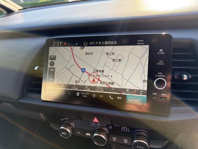 フィット ホーム　バックカメラ　ナビ　ＴＶ　クリアランスソナー　オートクルーズコントロール　レーンアシスト　衝突被害軽減システム　オートライト　ＬＥＤヘッドランプ　スマートキー　電動格納ミラー　ＣＶＴ　盗難防止システム（4枚目）