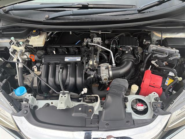 フィットハイブリッド Sパッケージ ハイブリッド バックカメラ ナビ TV オートクルーズコントロール 衝突被害軽減システム LEDヘッドランプ スマートキー アイドリングストップ 電動格納ミラー AT 盗難防止システム 衝突安全ボディ(20枚目)