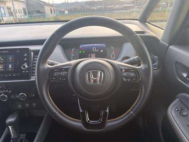 フィット ＲＳ　バックカメラ　ナビ　ＴＶ　クリアランスソナー　オートクルーズコントロール　レーンアシスト　衝突被害軽減システム　アルミホイール　オートライト　ＬＥＤヘッドランプ　スマートキー　電動格納ミラー　ＣＶＴ（3枚目）