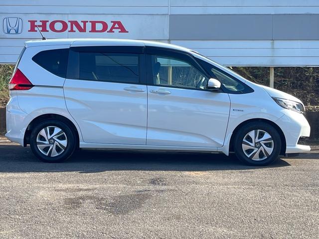 フリードハイブリッド ハイブリッド・Ｇホンダセンシング　ＬＥＤヘッドライト　弊社下取り車　ディーラーメン車両　ＥＴＣ　前後ドラレコ　純正ナビ　ＣＤ／ＤＶＤ再生可　ＴＶ　オートエアコン　Ｂｌｕｅｔｏｏｔｈ　追突軽減ブレーキ　車線逸脱抑制機能　リアカメラ（8枚目）