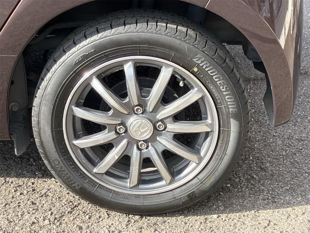 Ｎ－ＯＮＥ Ｇ・Ｌパッケージ　ＨＩＤヘッドライト　１４インチＡＷ　ナビ地デジＴＶ　バックカメラ　Ｂｌｕｅｔｏｏｔｈ　スマートキー　ＥＴＣ　プッシュスターター　電動格納ドアミラー　オートライト　オートエアコン　ベンチシート（36枚目）