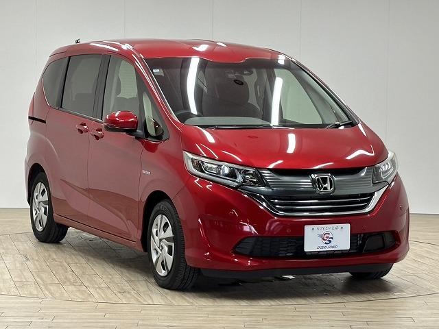 フリードハイブリッド ハイブリッド・Ｇホンダセンシング　後席モニター　純正９型ナビ　追従クルコン　クリアランスソナー　レーンキープアシスト　両側電動スライド　地デジ　Ｂｌｕｅｔｏｏｔｈ　バックカメラ　禁煙　横滑防止　エアバック　メモリーナビ（21枚目）