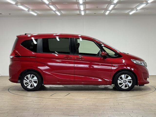 フリードハイブリッド ハイブリッド・Ｇホンダセンシング　後席モニター　純正９型ナビ　追従クルコン　クリアランスソナー　レーンキープアシスト　両側電動スライド　地デジ　Ｂｌｕｅｔｏｏｔｈ　バックカメラ　禁煙　横滑防止　エアバック　メモリーナビ（68枚目）