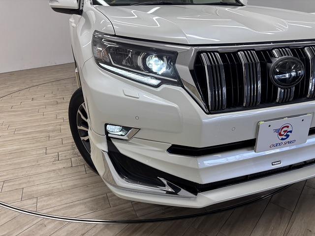 ランドクルーザープラド ＴＸ　Ｌパッケージ　モデリスタエアロ／サンルーフ／ルーフレール／純正９インチナビ／地デジ／白革／パワーシート／シートベンチレーション／純正ＯＰ１９インチＡＷ／レーダークルコン／レーンキープアシスト／軽減ブレーキ（54枚目）