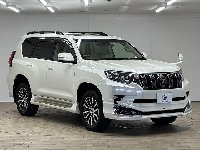 ランドクルーザープラド ＴＸ　Ｌパッケージ　モデリスタエアロ／サンルーフ／ルーフレール／純正９インチナビ／地デジ／白革／パワーシート／シートベンチレーション／純正ＯＰ１９インチＡＷ／レーダークルコン／レーンキープアシスト／軽減ブレーキ（63枚目）