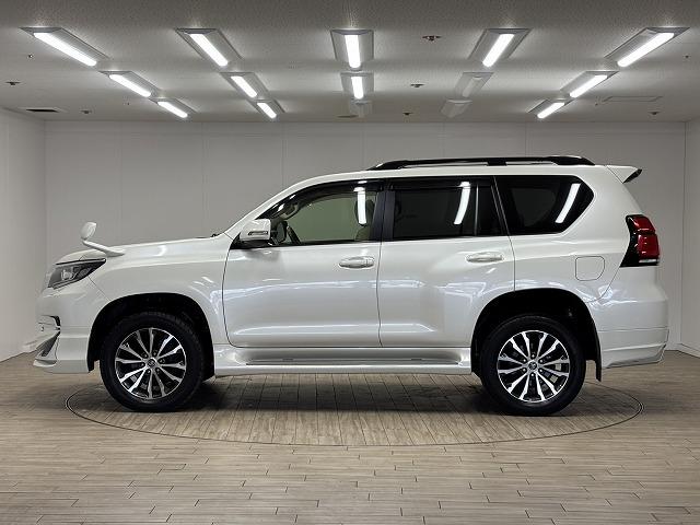 ランドクルーザープラド ＴＸ　Ｌパッケージ　モデリスタエアロ／サンルーフ／ルーフレール／純正９インチナビ／地デジ／白革／パワーシート／シートベンチレーション／純正ＯＰ１９インチＡＷ／レーダークルコン／レーンキープアシスト／軽減ブレーキ（66枚目）