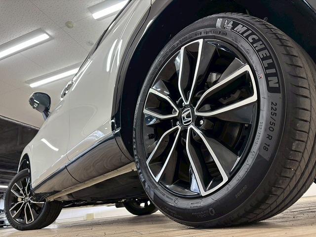 ヴェゼル e:HEV Z 純正9インチナビ/地デジ/バックカメラ/レーダークルコン/レーンキープアシスト/パワーバックドア/ダウンヒルアシスト/シートヒーター/クリアランスソナー/BSM/ETC/電動パーキングブレーキ(65枚目)